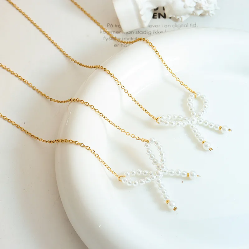 Wholesale PVD Coated Real Gold Plated Bow Knot Titanium Steel Elegant Waterproof Non Tarnish Necklace