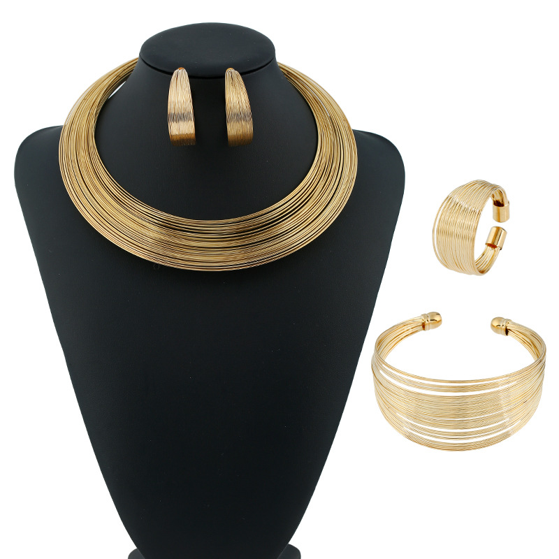 Wholesale European and American exrt explosions fashion striped metal collar necklace four-piece bracelet ring earring collar