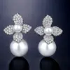 Wholesale High Quality RAKOL French Style Pearl Earrings For Women Creative Flower Micro-Paved Zirconia Fashionable Geometric Pattern