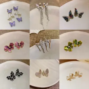 Wholesale Fashion Butterfly Bow Knot Copper Inlaid Zircon Artificial Pearls Earrings 1 Pair