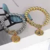 Wholesale Copper Beaded Plating Round Virgin Mary Bracelets