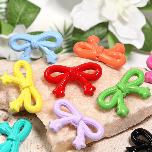 Wholesale Macaron-colored star and bow vertical hole beads