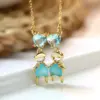 Wholesale Vintage Style Cartoon Character Doll Heart Shape Copper Plating Inlay Zircon Pendant Necklace