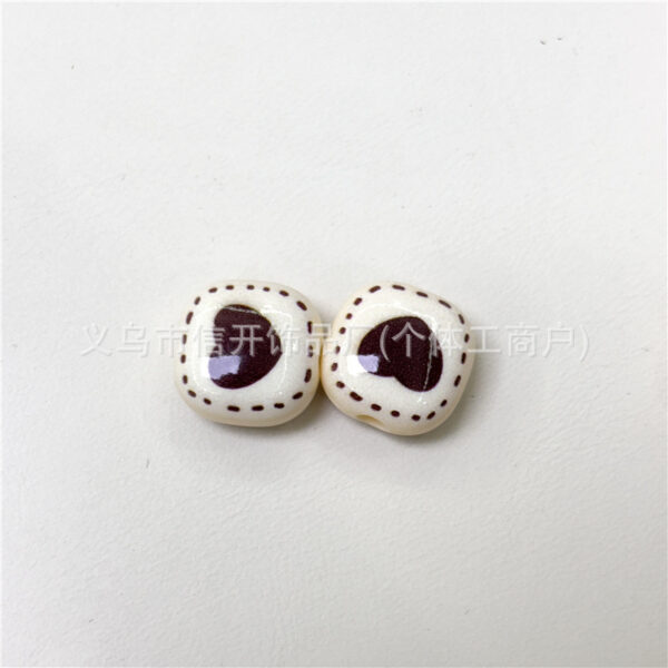 Wholesale Through-hole colorful heart-printed mini steamed bun beads