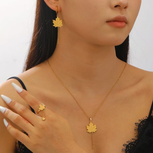 oly-8d706c9d086e617d4ba4b3ec0ca79cc4 Wholesale Tassel Maple Leaf Stainless Steel Pendant