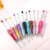 Wholesale DIY sequins beaded pen ins colorful resin ballpoint pen student gift pen can wear beads rotating cute pen