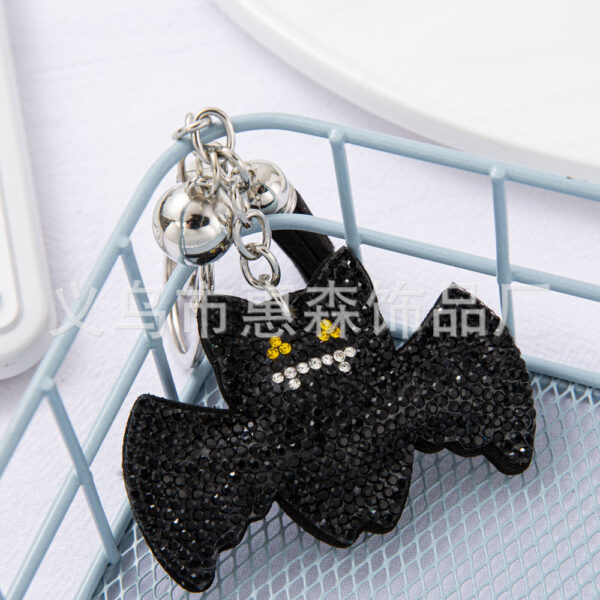 oly-8e1c0876230436430e21f495975d89be Wholesale Diamond studded bat keychain