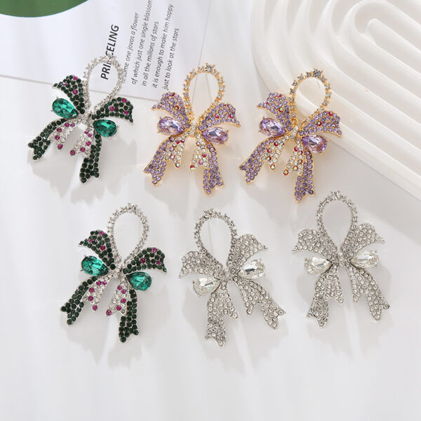 Wholesale European and American new fashion high-end sense full diamond bow silver needle earrings women's exquisite elegant colored diamond ear jewelry