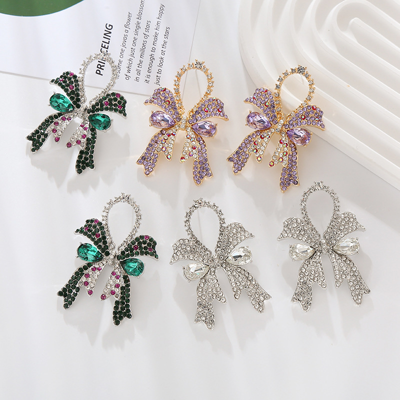 Wholesale European and American new fashion high-end sense full diamond bow sier needle earrings women's exquisite elegant colored diamond ear jewelry