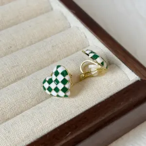14 # Triangular Ear Clip - Green Checkered Heart