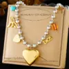 Wholesale Jewelry Modern Style Cross Heart Shape Bow Knot 304 Stainless Steel Plating Multi Charms Necklace Ball Chain