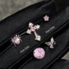 oly-8fdfb57fd3beea64c7f8623be9cd111e Wholesale Pink zircon cross ear bone nail titanium steel screw fireworks cut ear nail niche design butterfly earrings