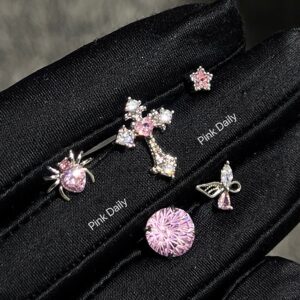 Wholesale Pink zircon cross ear bone nail titanium steel screw fireworks cut ear nail niche design butterfly earrings
