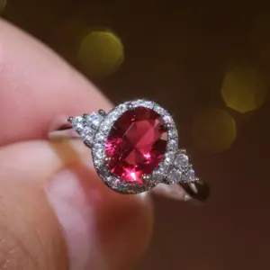 Wholesale Classic Fashion Copper Inlaid Red Zircon Oval Ring