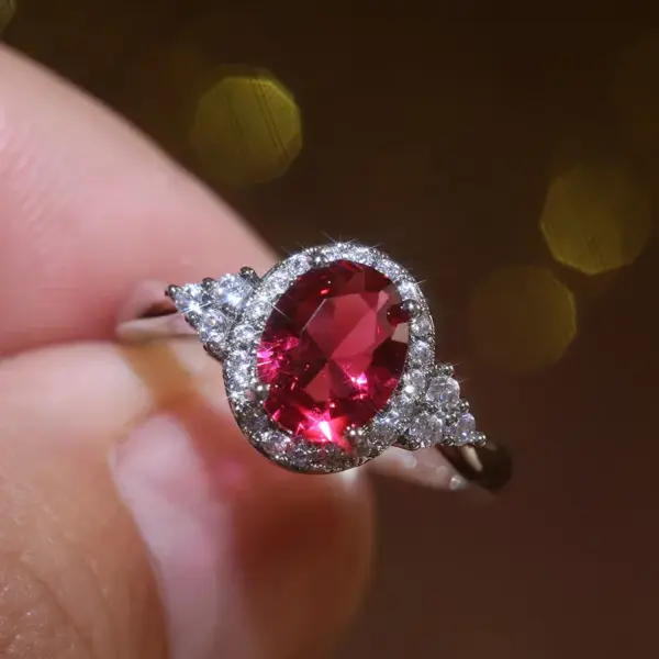 Wholesale Classic Fashion Copper Inlaid Red Zircon Oval Ring