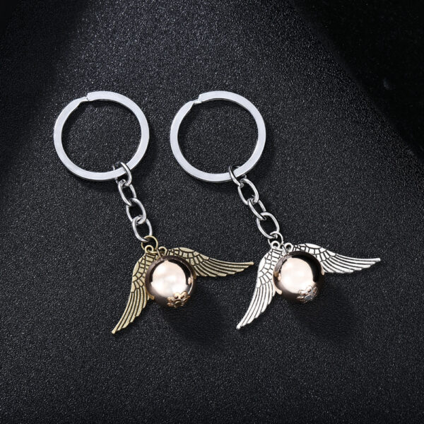 Wholesale European and American Cross-Border Hot Selling Fashion Deathly Saints Golden Snitch Keychain Fashion Alloy Car Key Chain Pendant