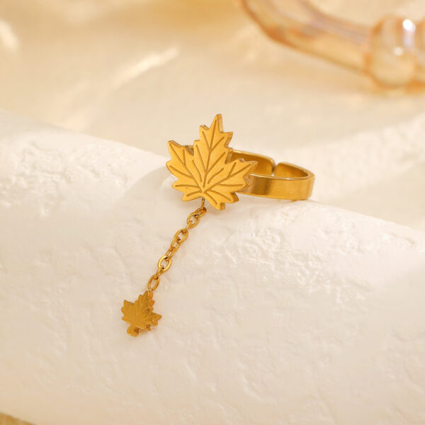 oly-9203dcecf95b8d06e08ba872194bf300 Wholesale Tassel Maple Leaf Stainless Steel Pendant