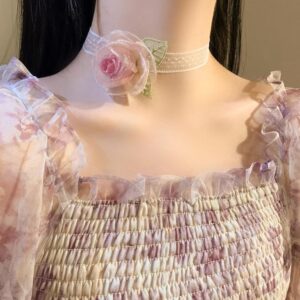 White yarn pink flower