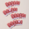 Wholesale Cross-border hand-worn armor wholesale 24 pieces of long nail pieces love bow French fake nails nail pieces