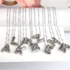 Wholesale Hip-hop Simple Style Classic Style Letter Copper Silver Plated Pendant Necklace In Bulk