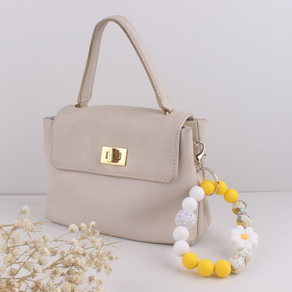 oly-92f02da444a58af4a3ca78095f3221cc Wholesale Spot Amazon Silicone Food Grade Silicone Bead Bracelet Spring and Summer Daisy Wrist Keychain Pendant Bracelet