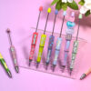oly-9300f3facefaed8ea1a44ed722c9ceb9 Wholesale Beadable pens, colorful English letter printed beads