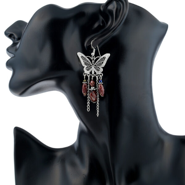 Wholesale European and American Retro Hollow Butterfly Tassel Earrings Fashion Jewelry Chain Tassel Personalized Earrings