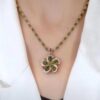 Wholesale Elegant disc bamboo jade pendant necklace women's imitation Jade Diamond five-petal flower gift for girlfriend Mother's Day