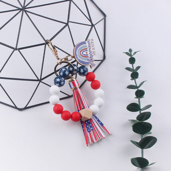 oly-94cb1dce204b90abe2247f632e39443d Wholesale New American Independence Day Wrist Keychain Pendant Leather PU Tassel DIY Beaded Bracelet Key Ring Accessories