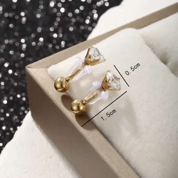 Wholesale 1 Pair Hip-Hop XUPING Punk Solid Color Plating Inlay 304 Stainless Steel Artificial Gemstones 18K Gold Plated Raw Steel Ear Studs