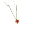 Wholesale Fashion Heart Shape Titanium Steel Copper Plating Hollow Out Inlay Zircon Pendant Necklace