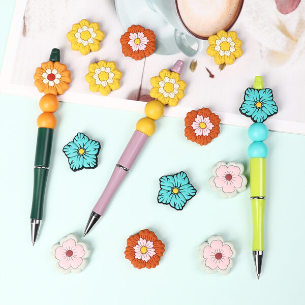 Wholesale New silicone flower bead DIY bracelet material kit, featuring cartoon children's beads and straight-hole silicone beads.