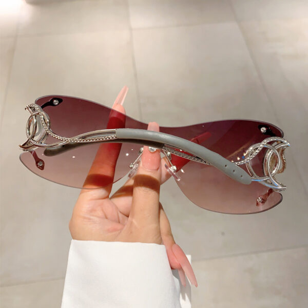 Wholesale Cross-border new personalized fashion frameless one-piece snake glasses legs sunglasses technology Y2K funny sunglasses