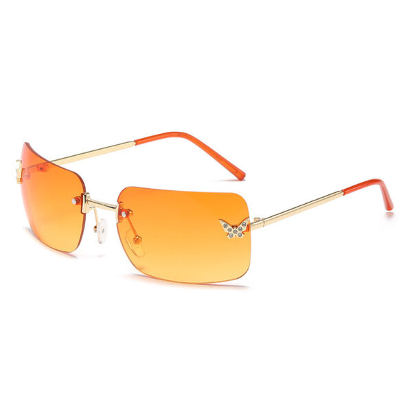 oly-95d6b80dd325d99324aea4759fc8f091 Wholesale frameless sunglasses sunscreen glasses fashion high sense butterfly aessories diamond sunglasses ladies