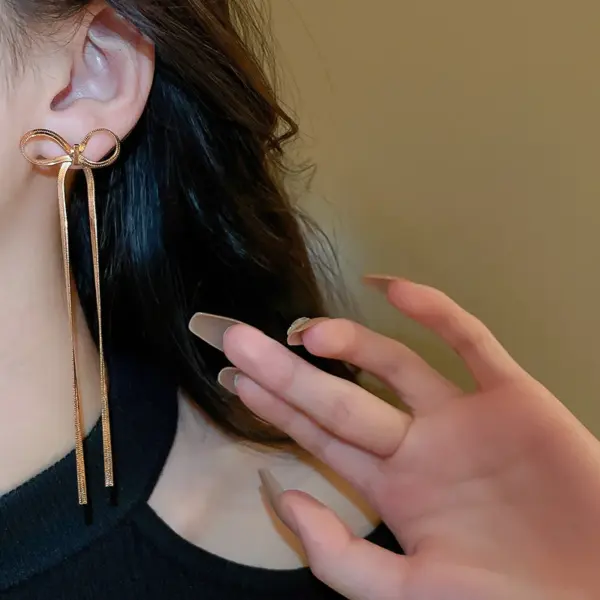 Wholesale 1 Pair Simple Style Bow Knot Plating Copper 18K Gold Plated Drop Earrings