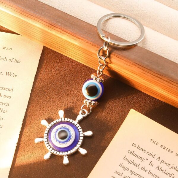 Wholesale Cross-border Explosions Devil's Eye Blue Eyes Keychain Retro Compass Moon Snowflake Pendant Backpack Pendant Accessories