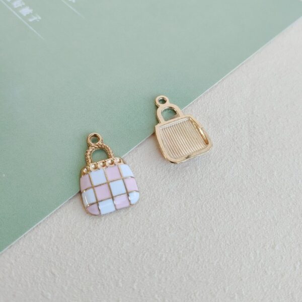 Wholesale cute cartoon bag oil dripping alloy jewelry pendant