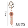 Wholesale New creative DIY cartoon daisy small tooth glue pendant handmade silicone beaded bag pendant keychain