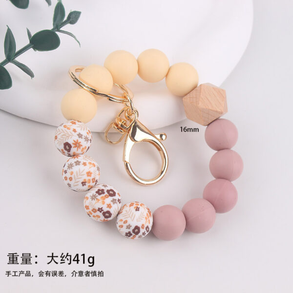 Wholesale In-Stock Temu Silicone Bead Bracelet Beech Wood Octagonal Print Silicone Wrist Keychain Pendant Bracelet