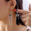 Wholesale New European and American cross-border Halloween earrings for women, niche and versatile design, pumpkin head ghost skull earrings