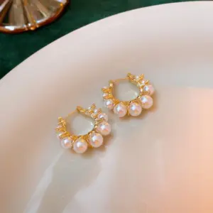 3# Golden Pearl Ear Clip.
