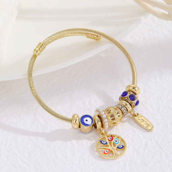 Wholesale European and American Hot Pandora Gold Stainless Steel Bracelet Women's Diamond-encrusted Fishtail Dolphin Alloy Pendant Adjustable Bracelet