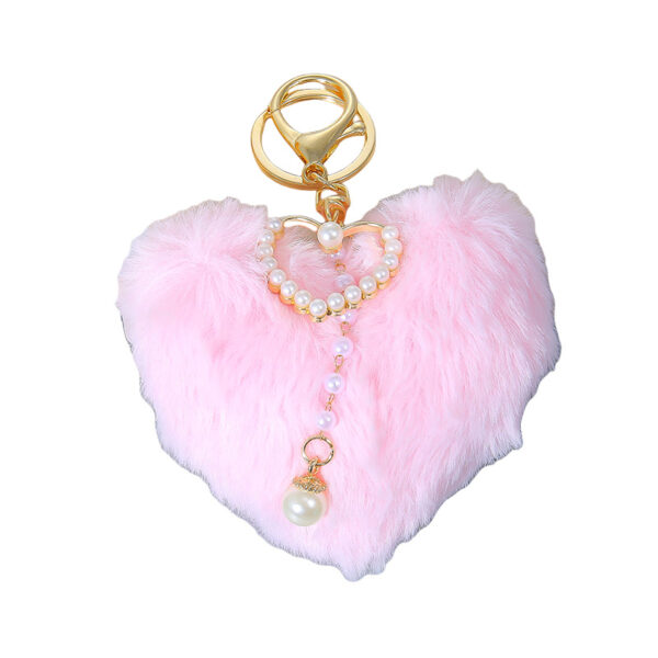Wholesale Autumn and winter love fur ball pearl keychain peach heart bag pendant car accessories plush pendant small gifts