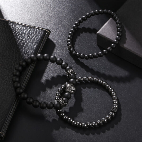 Wholesale European and American jewelry fashion vintage black frosted bracelet zircon crown diamond ball dice lion head beads bracelet suit