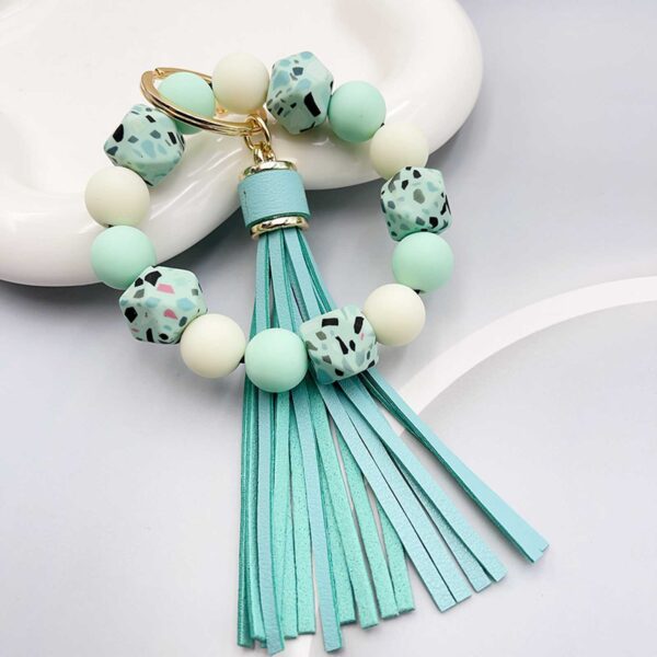 oly-9afeee43c19f8b1d1216650f696a187e Wholesale Camouflage Stone Silicone Beaded Wrist Keychain