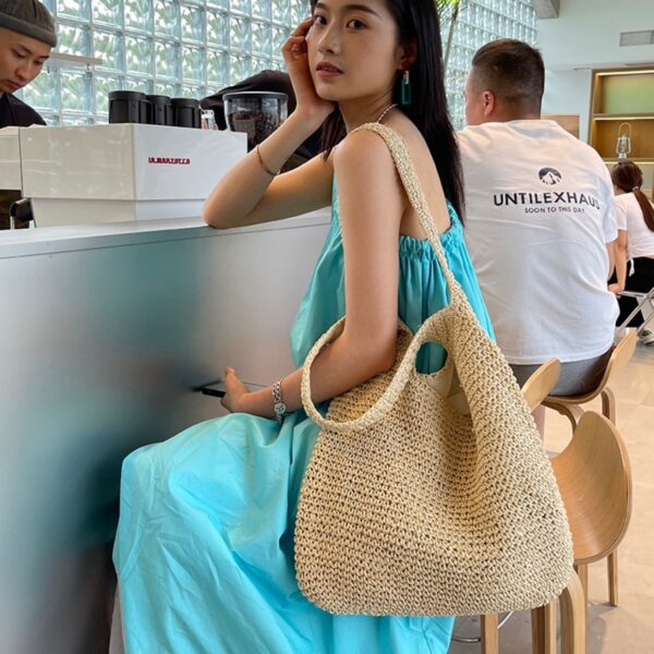 oly-9bca1de16af6dc8cdaae79aa0fc073dc Wholesale Summer Vacation Style Raia Straw Bag Large Capacity Versatile Casual Travel Beach Bag Single Shoulder Woven Bag Women's Light Luxury