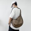 Wholesale Retro Men's and Women's Shoulder Bag Crossbody Dumpling Bag Large Capacity Tote Bag Men's Bag Commuter Bag Student Backpack Cycling Bag