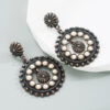 oly-9c8ea76267aa36a3470469d5cba5eecb Wholesale white turquoise earrings hollow round pendant exaerated party earrings