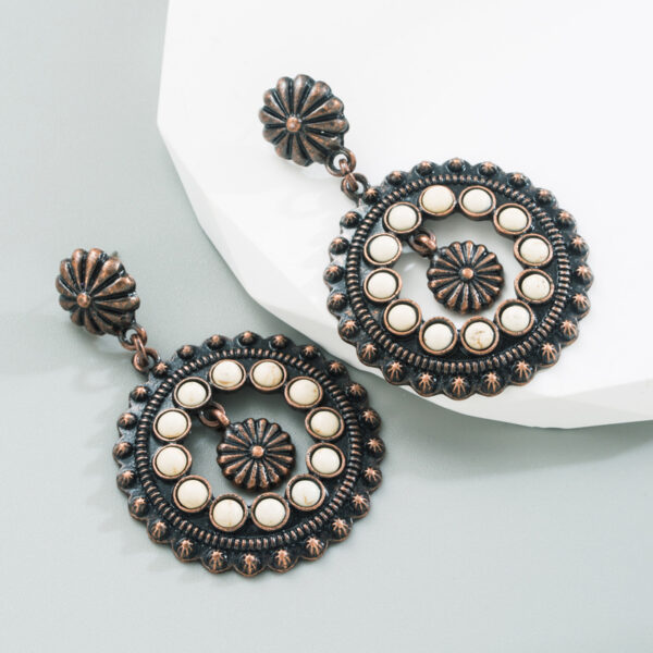 oly-9c8ea76267aa36a3470469d5cba5eecb Wholesale white turquoise earrings hollow round pendant exaerated party earrings