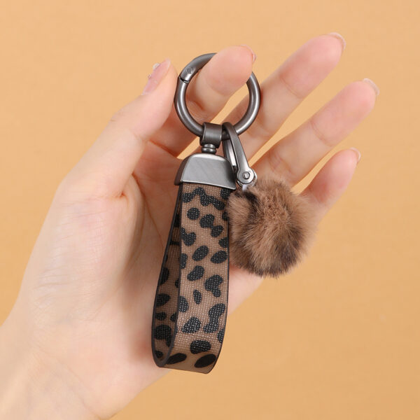 Wholesale Western cowboy style leopard print leather keychain bag charm plush pom-pom water bottle rope